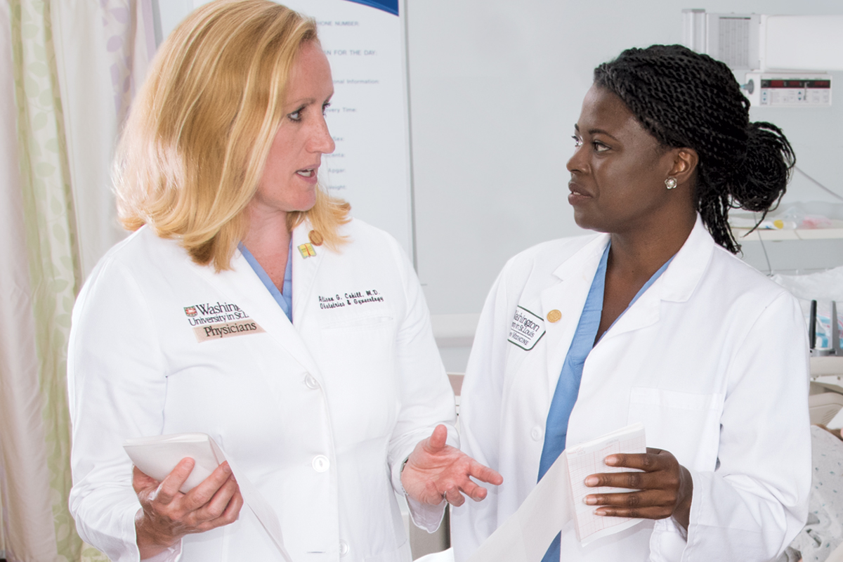 Research opportunities extend from the bench to the bedside. Above, Alison G. Cahill, MD, MSCI (left), associate professor of obstetrics and gynecology, confers with medical student Fayola Fears about a research project focused on infant neurodevelopment. 